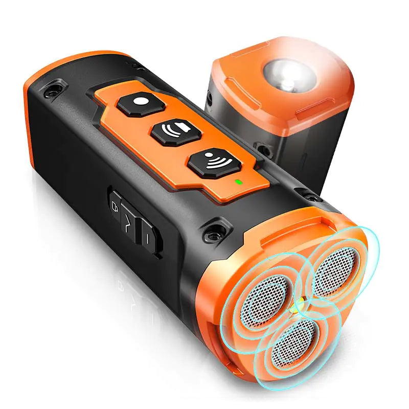 Orange and black ultrasonic deterrent device with buttons and a light on a white background